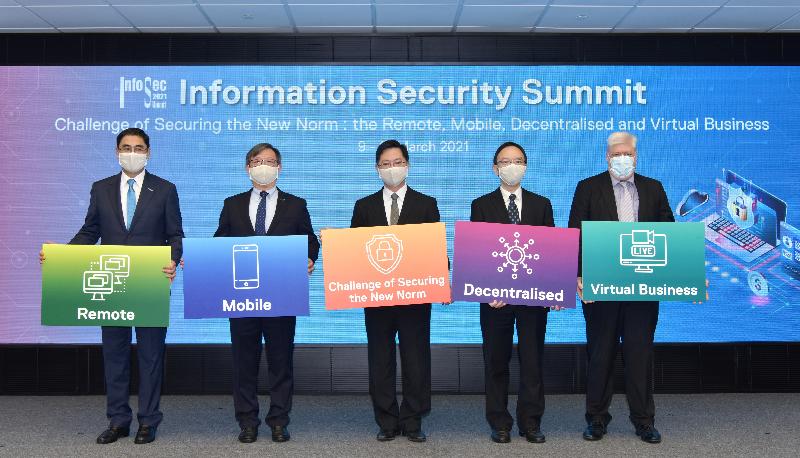 The Secretary for Innovation and Technology, Mr Alfred Sit (centre); the Government Chief Information Officer, Mr Victor Lam (second right); the Chairman of the Hong Kong Productivity Council (HKPC), Mr Willy Lin (second left); the Executive Director of the HKPC, Mr Mohamed Butt (first left); and the Chairman of the Information Security Summit 2021 Organising Committee, Mr Dale Johnstone (first right), officiate at the Information Security Summit 2021 today (March 9).