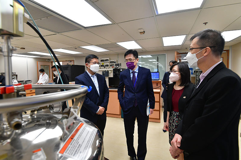 The Secretary for Innovation, Technology and Industry, Professor Sun Dong (third right), tours the Standards and Calibration Laboratory (SCL) of the Innovation and Technology Commission to learn about the SCL's operation and services. Looking on is the Commissioner for Innovation and Technology, Ms Rebecca Pun (second right).