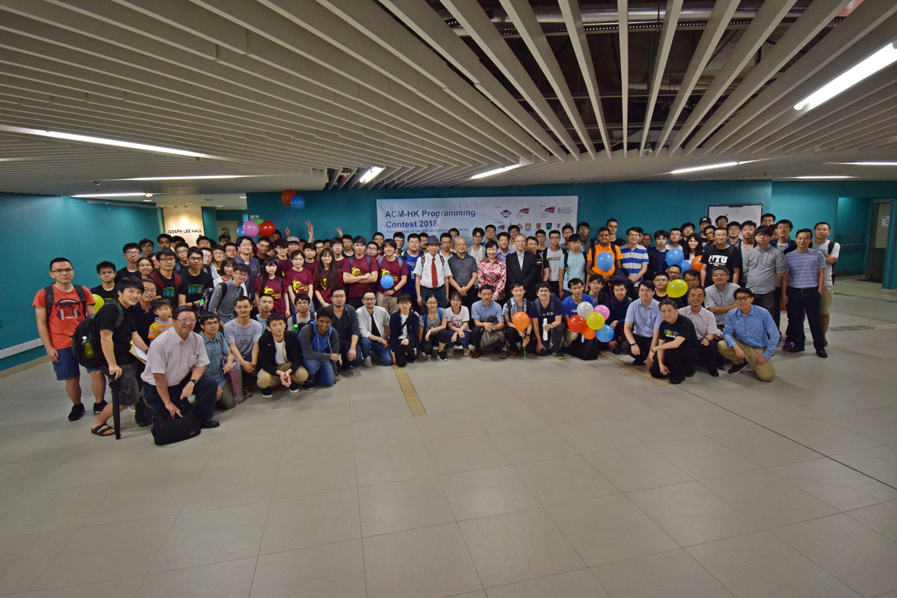 Mr. Victor Lam, Deputy Government Chief Information Officer at the Ceremony of the ACM-HK Programming Contest with Other Guests and Students