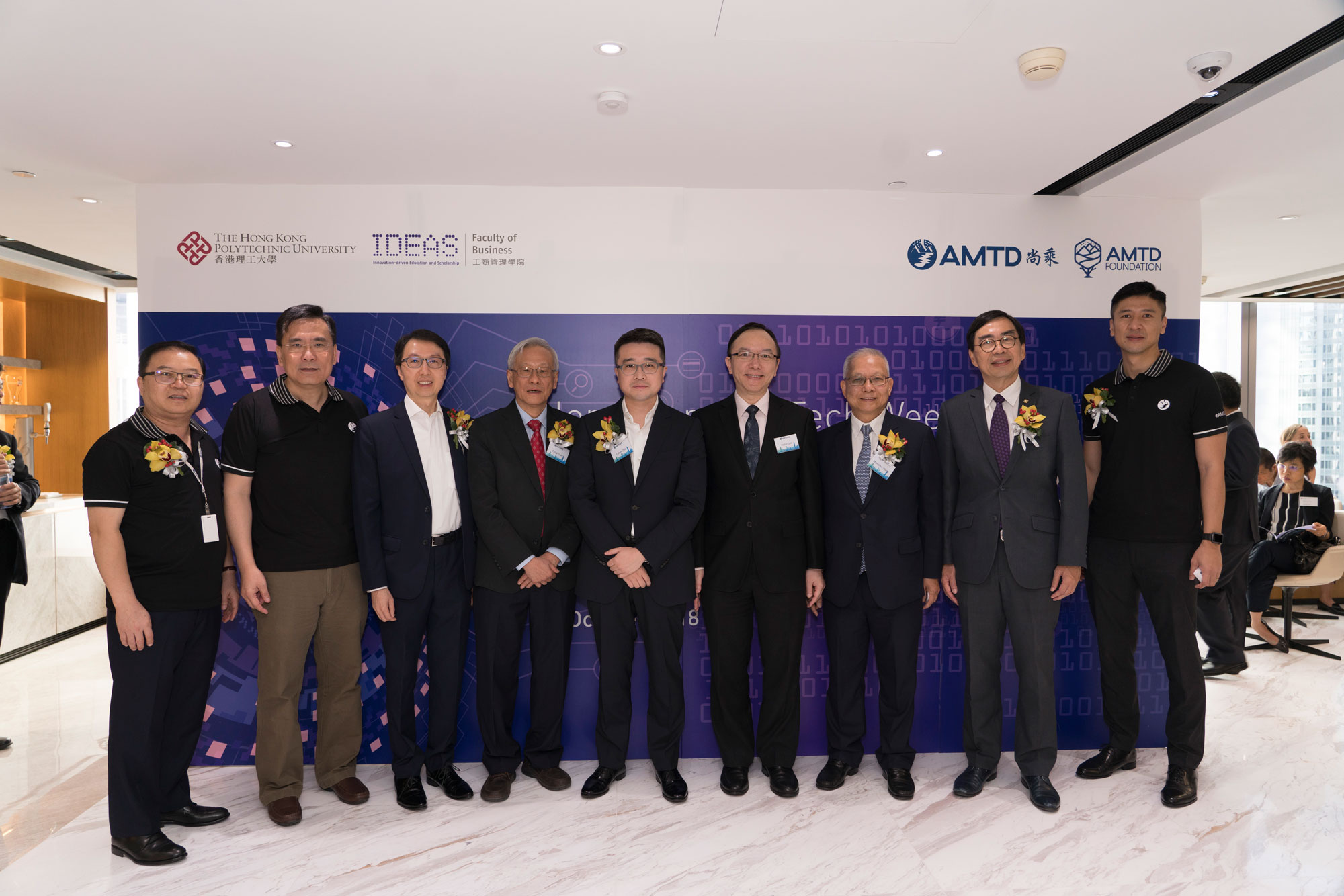 Mr. Victor Lam, Government Chief Information Officer (6th left), in group photo with Mr. Ros Lam, Chief Strategy Officer, AMTD Group, Mr. Yat Kin Sin, Chief of Staff, AMTD Group, Mr. Raymond Yung, CEO, LR Capital Group; Vice Chairman, Global Advisory Committee, AMTD Group, Prof. Philip Chan, Deputy President and Provost of PolyU, Mr. Calvin Choi, Chairman and President, AMTD Group (from 1st left to 5th left), Mr. Marcellus Wong, Vice Chairman, AMTD Group, Prof. Edwin Cheng, Dean of Faculty of Business of PolyU and Mr. Philip Yau, CFO, AMTD Group (from 7th left to right).