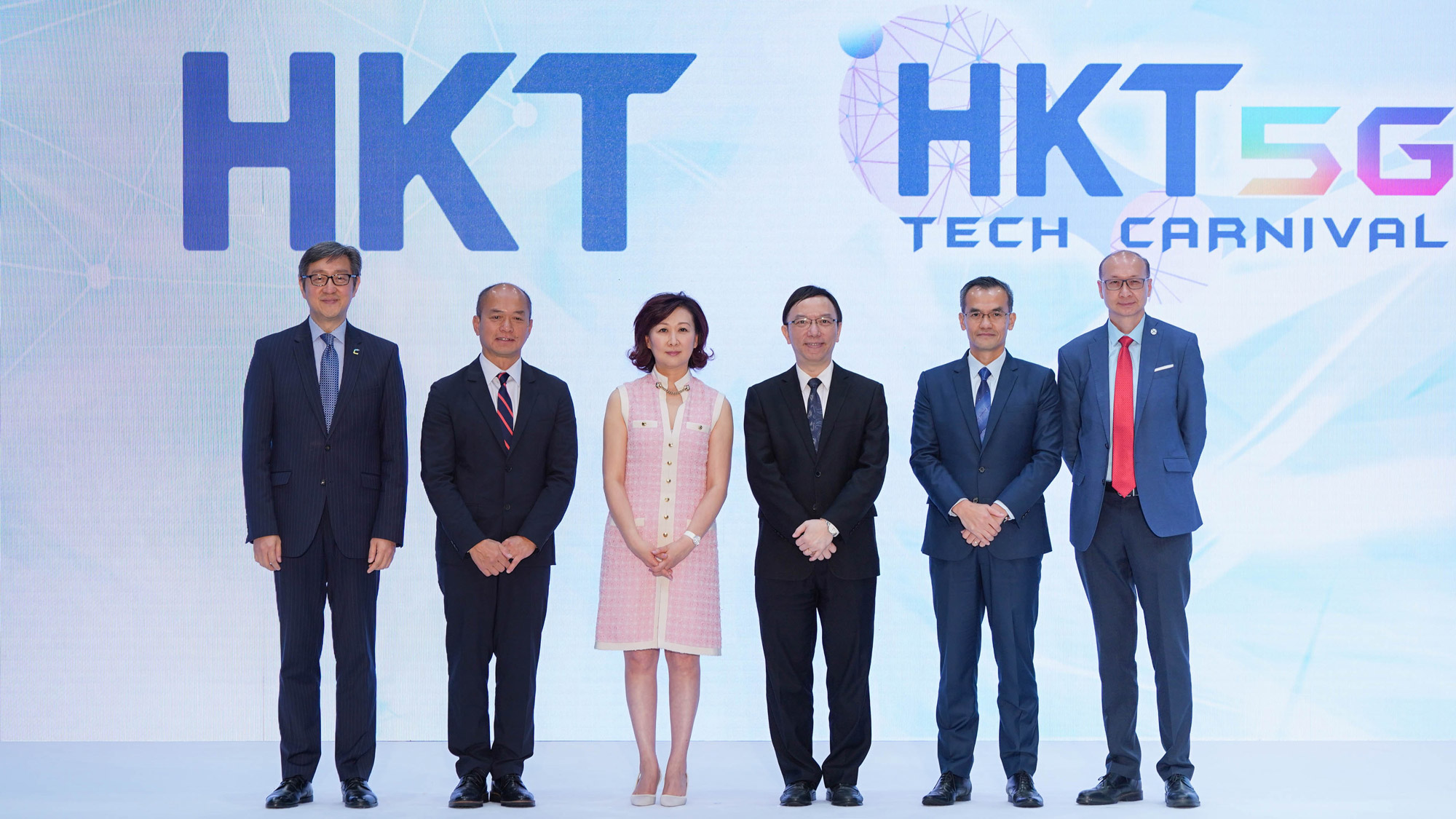 Mr. Victor Lam, Government Chief Information Officer (third right), in group photo with Ms. Susanna Hui, Group Managing Director of HKT (third left), Mr. Peter Yan, Chief Executive Officer of Cyberport (first left), Mr. ST Liew, Vice President of Qualcomm Technologies Inc. (second left),  Mr. Hugh Chow, Chief Executive Officer of Applied Science and Technology Research Institute (second right) and Mr. Peter Yeung, Head of Electronics & ICT Clusters, Smart City Platform, Hong Kong Science & Technology Parks Corporation, at the opening ceremony of HKT 5G Tech Carnival.