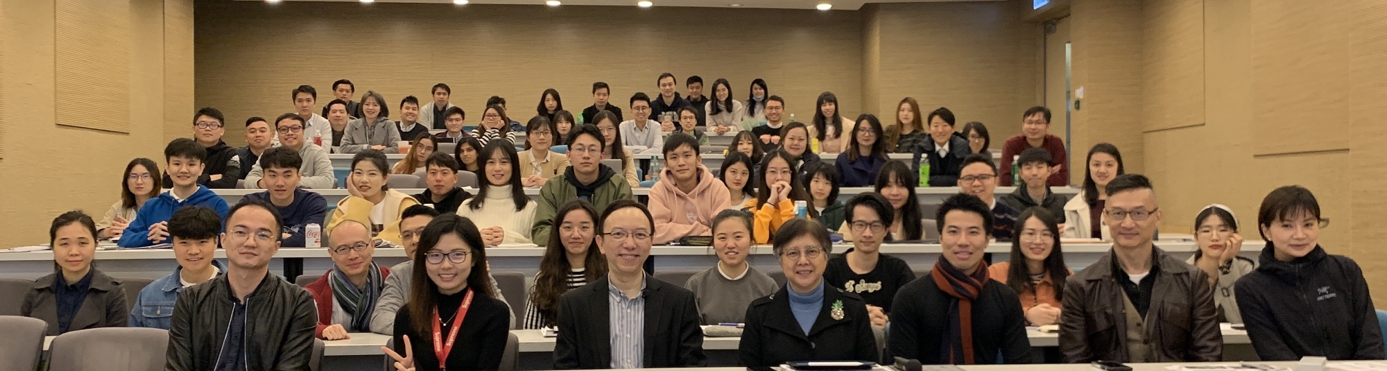 Mr. Victor Lam, Government Chief Information Officer (front row, third left) with Prof. Winnie Tang, Honorary Professor, Department of Computer Science, HKU (front row, fourth left) and other guests and students at guest lecture on "The Concepts and Initiatives of Smart City" at HKU.