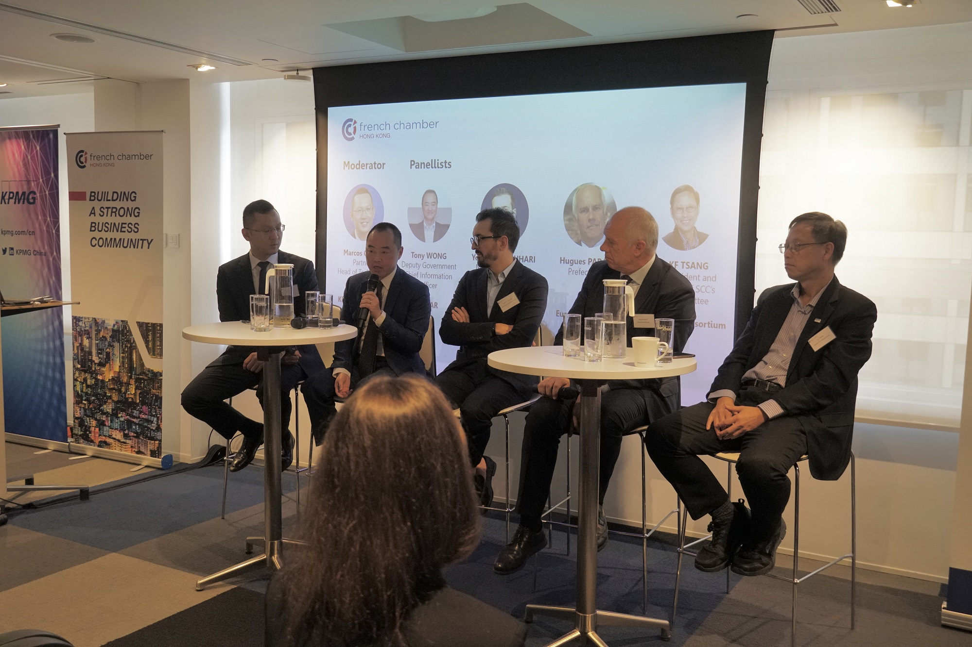 Mr. Tony Wong, Deputy Government Chief Information Officer (second left), joins panel discussion with Mr. Marcos Chow, Partner, Head of Technology Enablement, KPMG Hong Kong (first left); Mr. Yoann El Jaouhari, Managing Director Hong Kong and Macau, JCDecaux Cityscape (third left); Mr. Hugues Parant, Prefect, CEO, Euroméditerranée (second right); and Dr. K F Tsang, Vice President of Smart City Consortium (SCC) and Chairman of SCC's IoT Committee (first right).