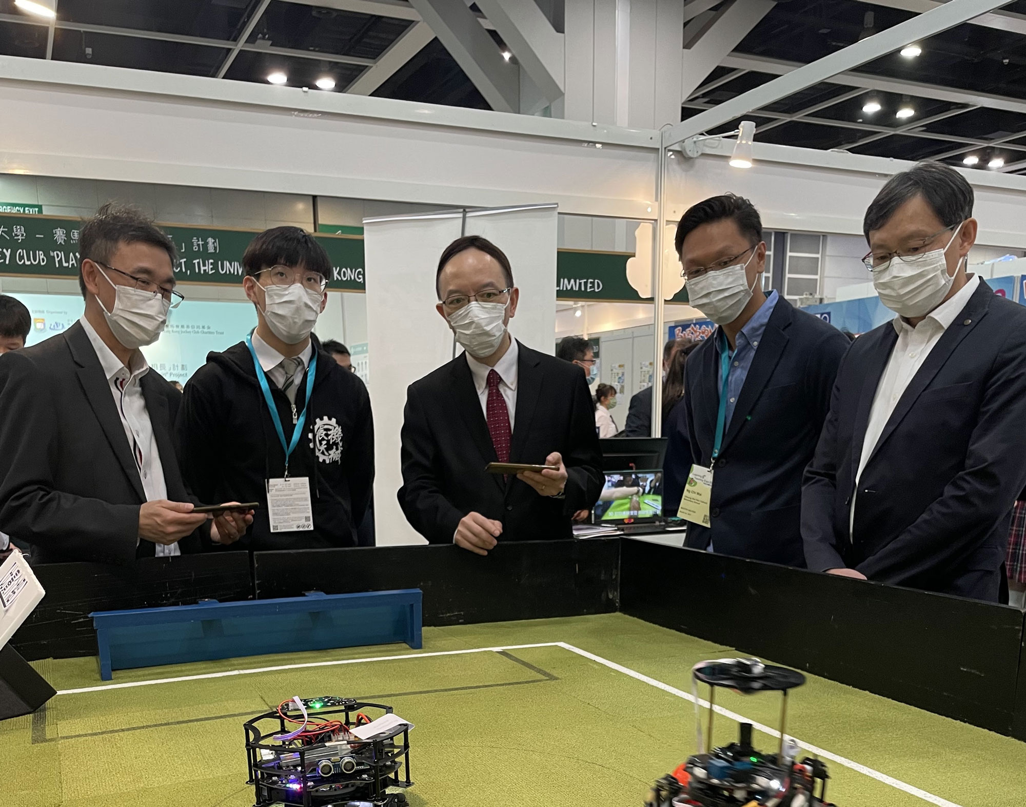 Cheung Sha Wan Catholic Secondary School demonstrated their "Soccer Robot" which won the 1st and 2nd places in the RoboCup Junior Sim 2021 (Asian Region) and was named the Champion of the RoboCup Junior WorldWide 2021 (Soccer Lightweight).