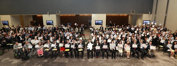 Group photo with officiating guests and representatives of all commended organisations